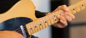 Read more about the article How to Play Guitar FASTER: 5 Actionable Tips