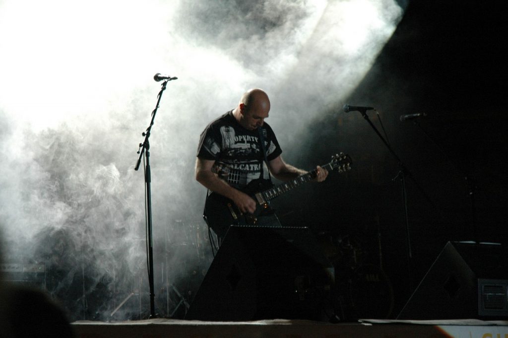 guitar player on a stage