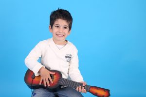 Read more about the article Top 6 Talented Guitar-Playing Kids That Will Make You Want To Throw Your Guitar Away